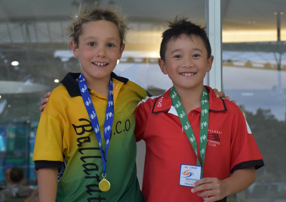 SHARED JOY: Mackenzie Crocker (GCO) and Bosco Ju (Ballarat SC) were on the podium in the Victorian Country all-junior boys' eight-year 50m backstroke.