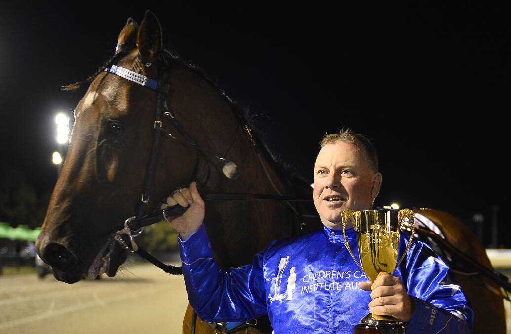 WINNING COMBINATION: Anthony Butt with Smolda with the Ballarat Pacing Cup trophy - Smolda's second and Butt's third. Pictures: Dylan Burns