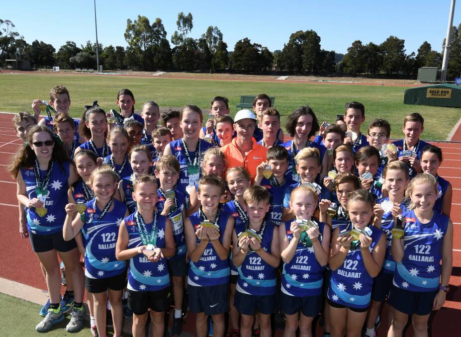EXCITED: Australian javelin throwing record holder Kathryn Mitchell surrounded by Ballarat Little Athletics members bound for state championships. Picture: Lachlan Bence