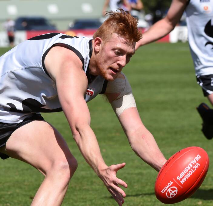 TOUGH TIME: Andrew Boseley will be a key member of the Roosters' defence which has the task of combatting a tall Richmond forward line at Punt Road Oval.