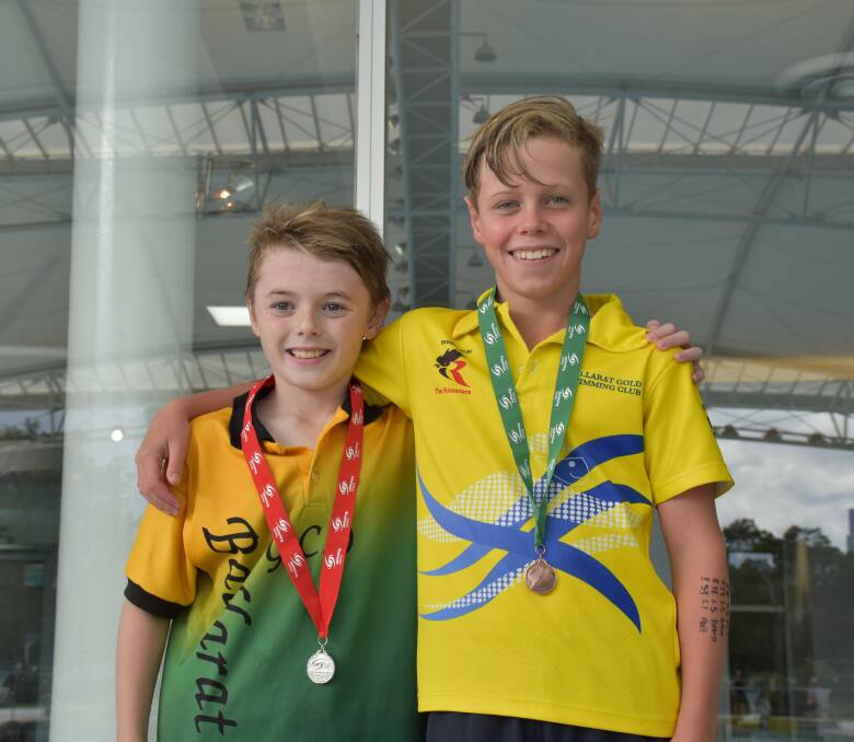 SUCCESS: Edward Meddings (GCO) and Giles Peters (Ballarat Gold) on the podium for the 11-year boys' 50m breaststroke