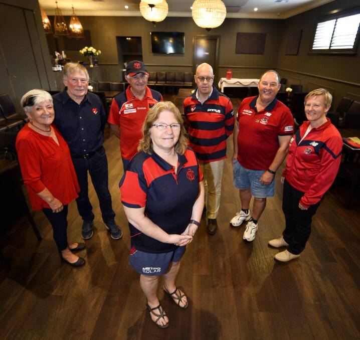 ALL IN: Hazelie Robinson with fellow Demon supporter group members Roberta Laurie, Ralph Laurie, Denis Costigan, David Berry, Neil Brown and Amanda Dobbin. Picture: Dylan Burns