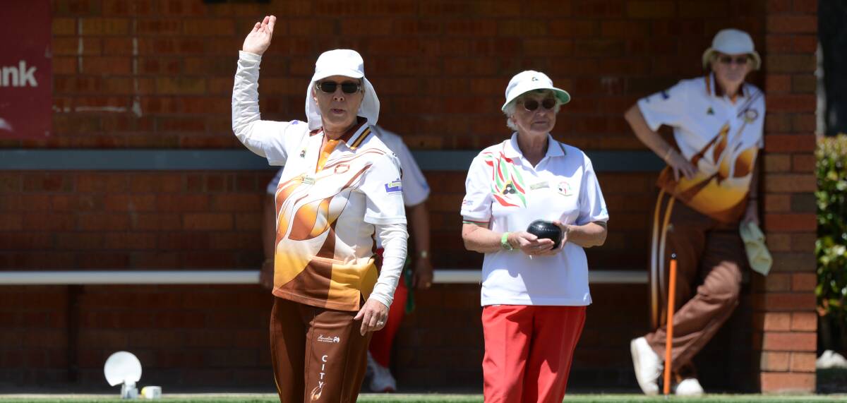 CLOSER: Janine Roberts (City Oval) urges on her bowl while Maureen Tate (Daylesford) watches on in BDBD midweek pennant. Picture: Kate Healy
