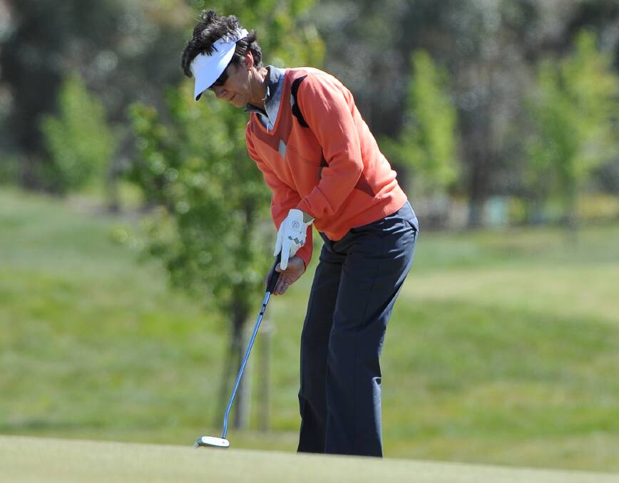 FOCUSED: Jo Sellen, of Maffra, is full of concentration as she works the Ballarat Golf Club greens. She tied for 13th after two rounds to advance to the quarter finals. Picture: Lachlan Bence