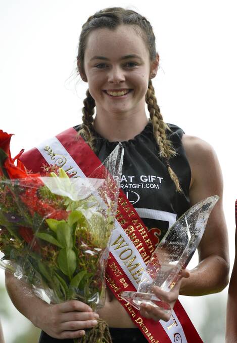 SMILEY: Keely Henderson with the spoils of her Ballarat Women's Gift triumph on Sunday. Picture: Dylan Burns