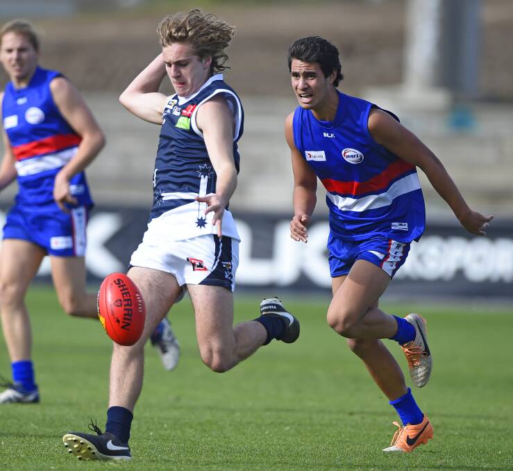 LEADING THE WAY: The BFL under-19s did not have too much go its way, but on this occasion Kayle Hayes had time to get boot to ball. Picture: Luka Kauzlaric 