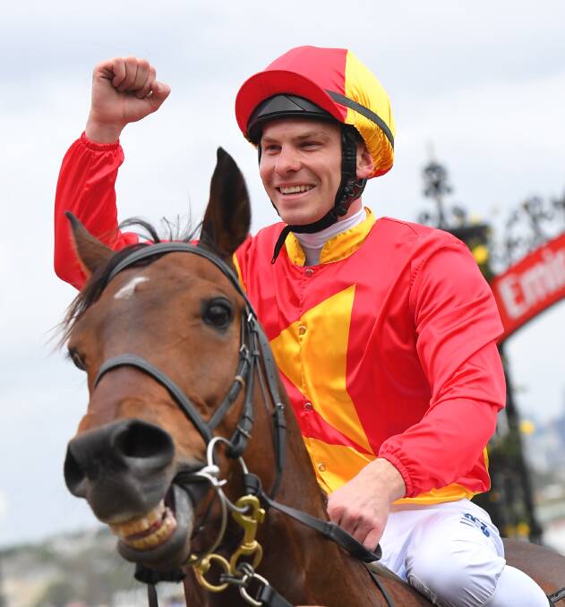 FIST PUMP:  Ben Melham celebrates his group 1 win on Malaguerra in the Darley Classic at Flemington. Picture: Getty Images