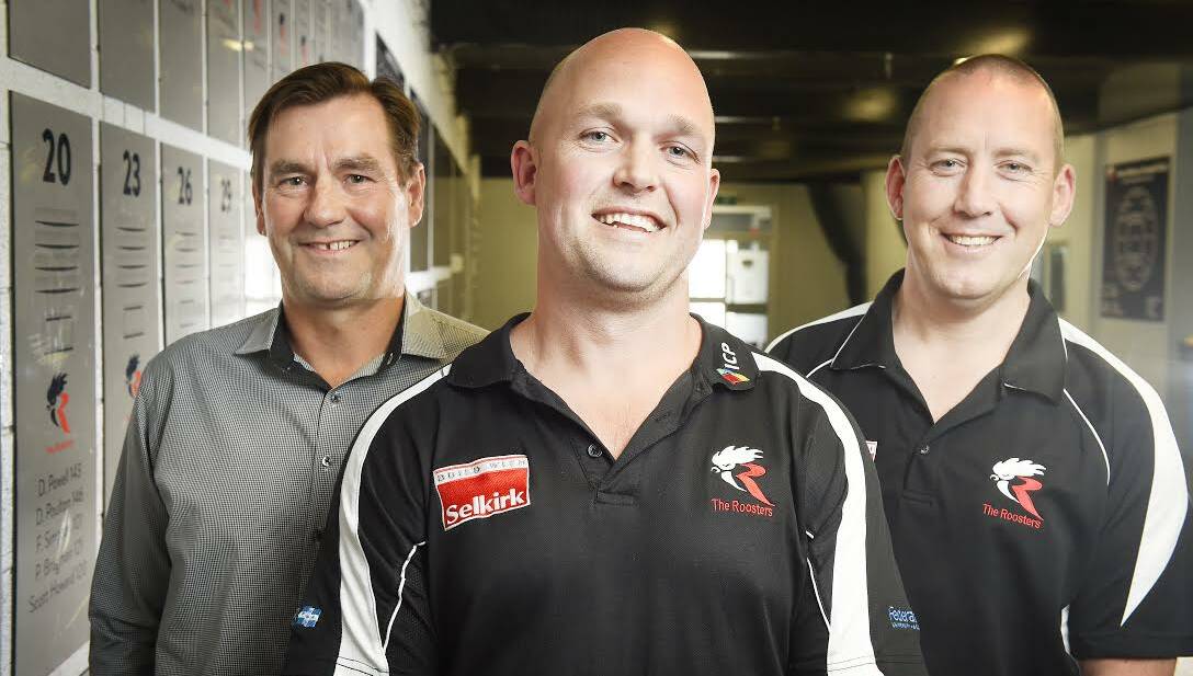 New North Ballarat Roosters head coach Marc Greig flanked by club chief executive officer Mark Patterson, left, and acting chairman Pater Carey.