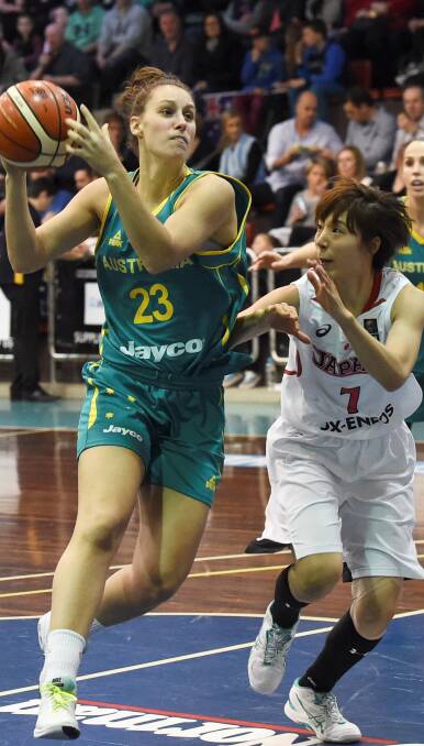 CLOSE ATTENTION: Japan's Mika Kurihara keeps a close check on Stephanie Talbot at the Minerdome. Picture: Lachlan Bence