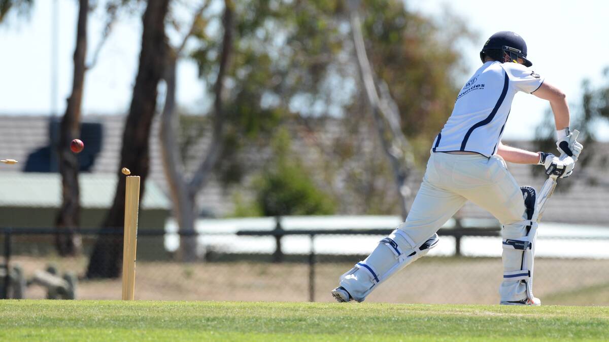 GONE: The bails go flying as Ben Longhurst gets past the defence of Mt Clear opening batsman Darcy Thomson at Alfredton on Sunday. Picture: Kate Healy