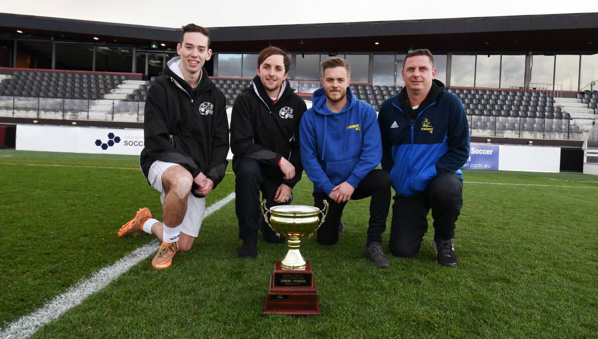 
ALL SET: North United captain Nic Richardson and coach Tim Beggs with Sebastopol Vikings coaches Sam Young and Rod Oppenhuis, and the premiership cup. Picture: Kate Healy 