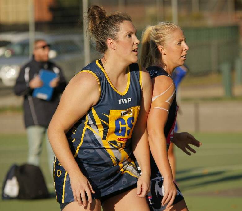 STAR SHOOTER: Bendigo's Gabe Richards tussles with Emma Inverarity. Richards was a dominant force in attack as Bendigo won 60 goals to 38. Picture: Dylan Burns