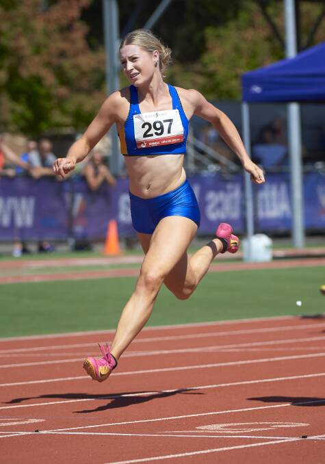 BACKMARKER: Holly Dobbyn stretches out in the 100m at Victorian Country Track and Field Championships in Ballarat at the weekend. Picture: Luka Kauzlaric