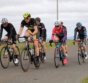 TUCKED AWAY: Liam White, second from right, sits on the back of Jez McInnes, with Pat Shaw on his wheel. Picture: Ballarat Sebastopol Cycling Club
       