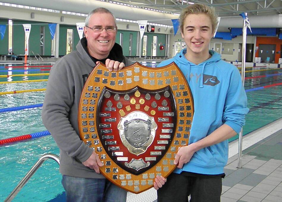 TOP GUN: Ballarat Gold president Rod Henwood and Josh Brien with the Midlands District Amateur Swimming Association's J.W. Clegg Shield