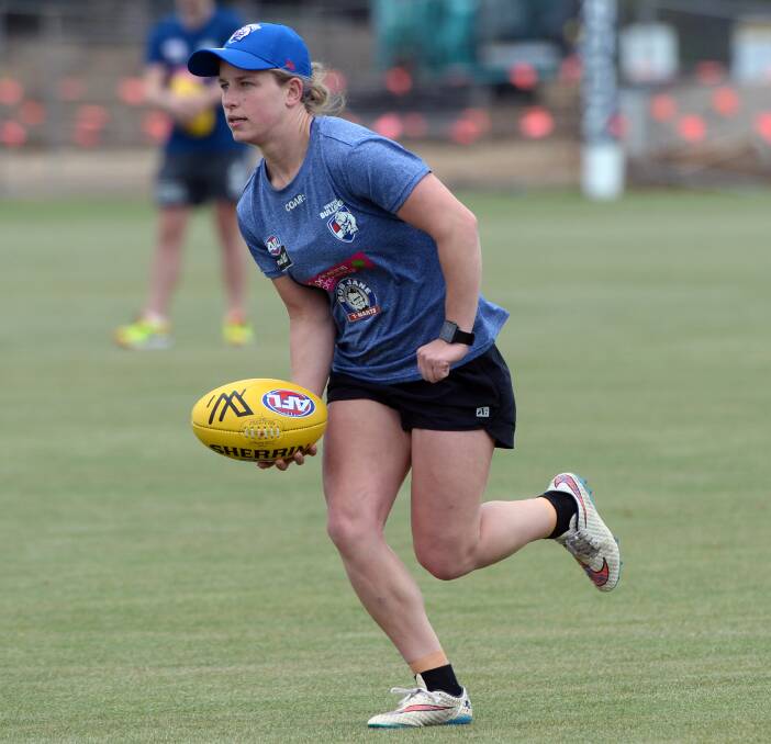TOP PICK: Jaimee Lambert, who was the Bulldogs' first selection in the AFL women’s draft, works on hand skills at a Ballarat training session. Picture: Kate Healy