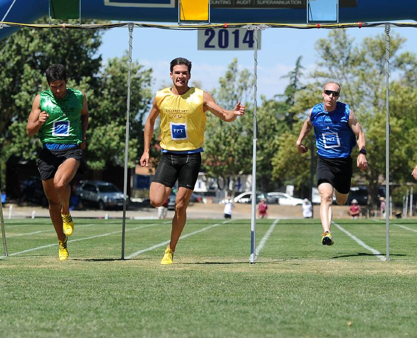 TRIUMPHANT: Nathan Riali runs to victory in the 2014 Ballarat Gift.