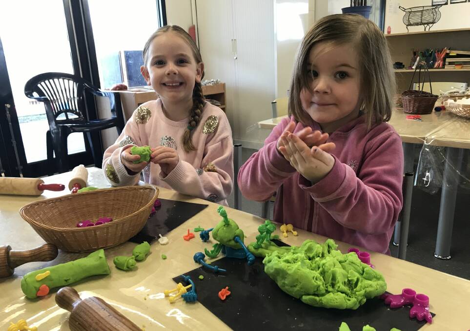 PLAYTIME: Skylar, 5, and Ari, 4, make playdough creatures in their new kinder rooms at Bonshaw Early Learning Centre, which also contains a maternal and child health centre and community rooms. Picture: Michelle Smith