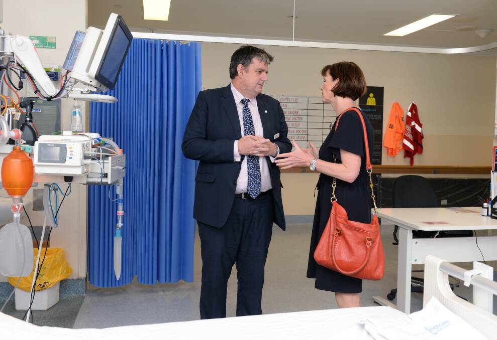 FLU FIGHTBACK: BHS chief executive Dale Fraser and government cabinet secretary Mary-Anne Thomas in the Base Hospital's emergency department. Picture: Kate Healy