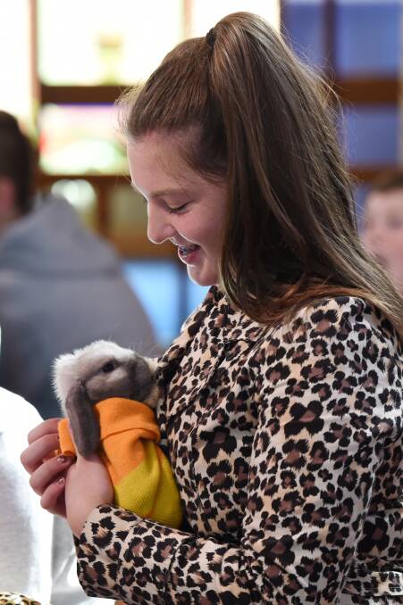 BLESSED: Michelle Donaldson, 16, smiles at Harvey who attended St Matthews Anglican Church Wendouree for the blessing of the animals. Pictures: Kate Healy
