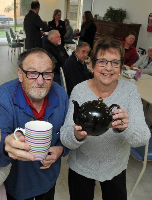 TEA TIME: Sovereign Gardens residents Wesley Kinnersly and Val Squire take tea for two yesterday as part of the Cancer Council's Australia's Biggest Morning Tea fundraiser. Picture: Lachlan Bence.