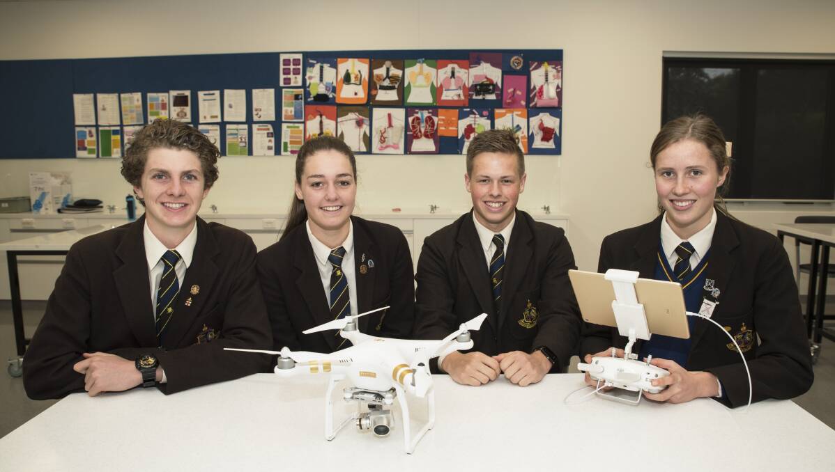 FUTURE: Ballarat Grammar students Will Tickner, Lily Bond, Harrison Mulcahy and Abby Burrows consider a high-flying future involving drones and technology. 