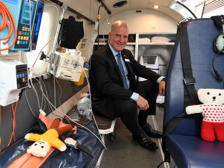 CELEBRATING: RFDS Victorian chief executive Scott Chapman in the service's aeromedical simulator in Ballarat this week. Picture: Lachlan Bence