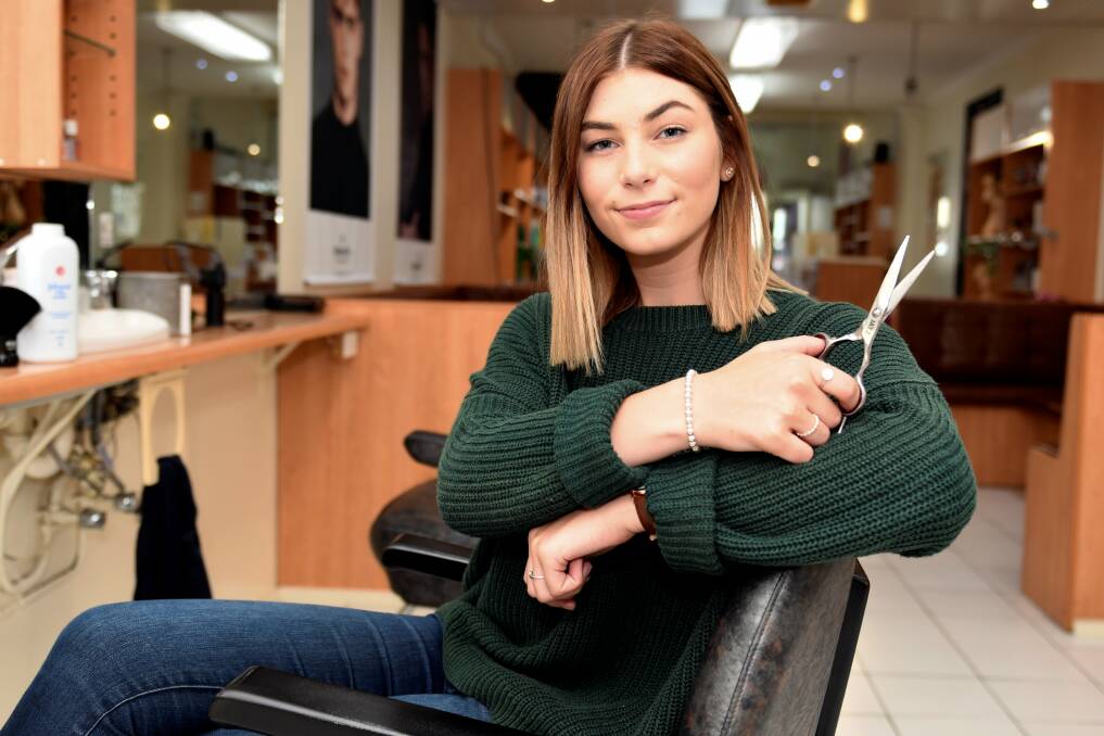 CUTTING: Olivia Spagnolo finished year 12 at Ballarat High School but bypassed her final exams in favour of starting a hairdressing apprenticeship. Picture: Lachlan Bence