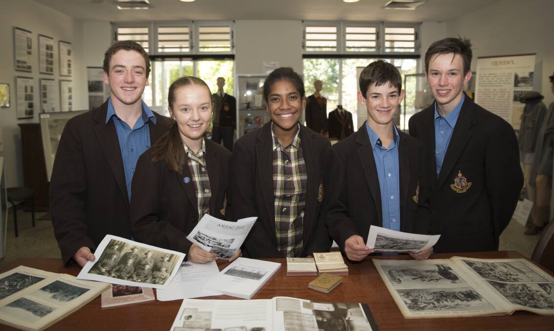 ANZAC: Spirit of ANZAC award winners Noah Esmonde, Jacinda Luttrell, Una Nawai, Jeremy Aked and Adam Van Donk inspect historic archives. 