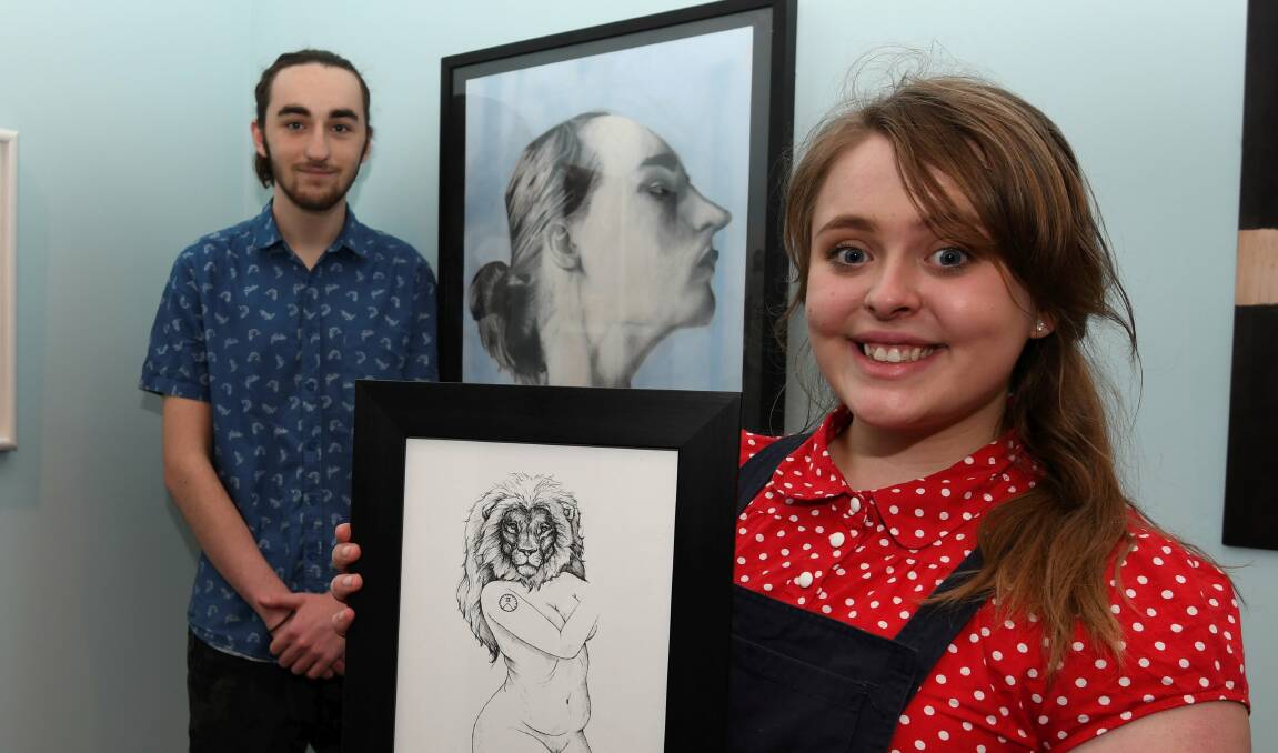 Local students Patrick Staley and Tahlia Stanton with their art works that were on display in the 2018 Next Gen exhibition at the Art Gallery. Picture: Lachlan Bence