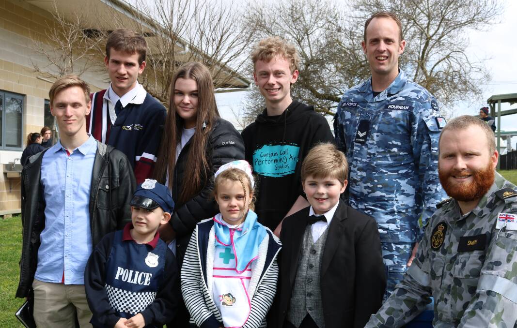 CAREERS: Ballarat Christian College senior students (back row) Lachlan, Matthew, Hannah and Hayden with the RAAF's Corporal Samuel Hourigan, and junior pupils (front row) Joseph, Tegan and Quinn with the Australian Navy's Leading Seaman Blair Smith.
