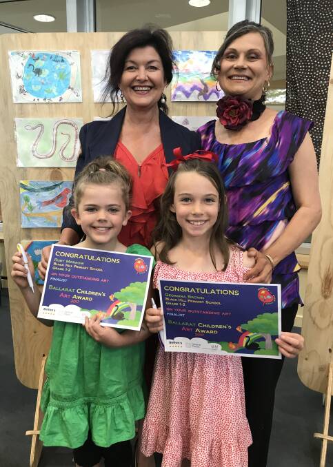 FINALISTS: Ruby and Georgina from Black Hill Primary School receive their certificates from mayor Samantha McIntosh and artist judge Karolina. Picture: Michelle Smith