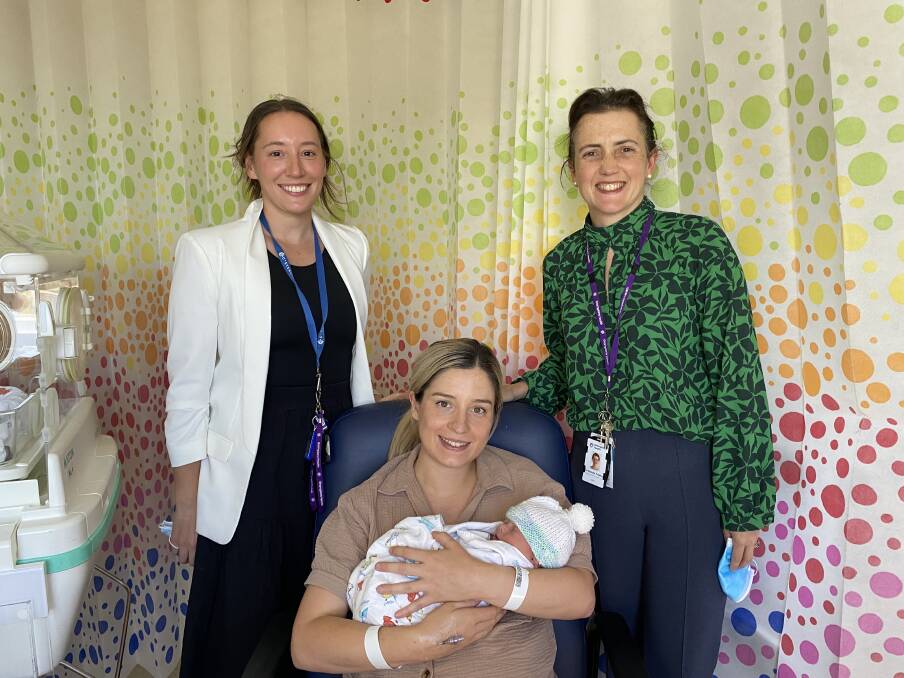 Grampians Health midwife and clinical trials coordinator Taegen Burnside, and head of obstetrics and gynaecology Dr Natasha Frawley, with Brittany Santilla and her son Max. Picture supplied