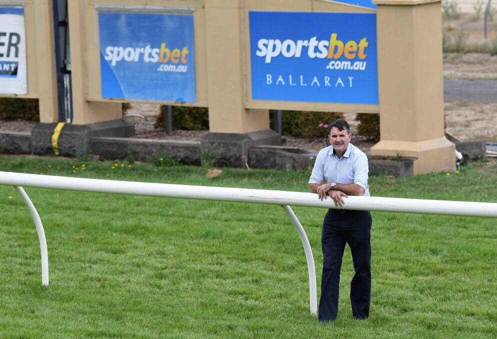 ON TRACK: Ballarat Turf Club chief executive Lachlan McKenzie celebrates after Racing Victoria announced that Ballarat racecourse would be home to a new all-weather synthetic track. Picture: Lachlan Bence