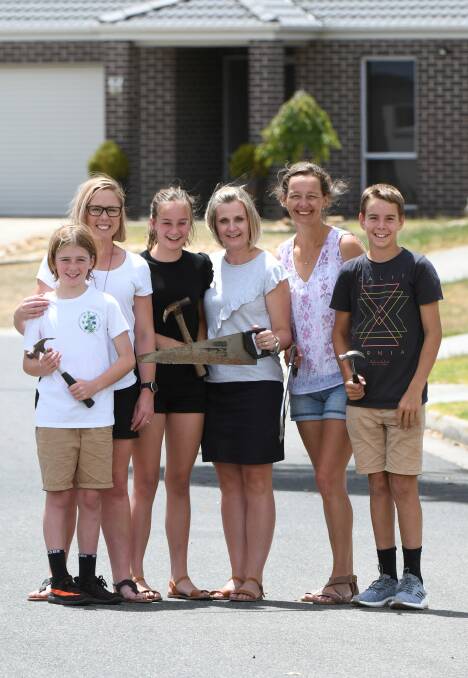 BUILDERS: Jack and Sarah Lamanna, Morgan and Danielle McCann, and Maryanne and Hugh McKenzie will build homes in Cambodia next year. Picture: Lachlan Bence