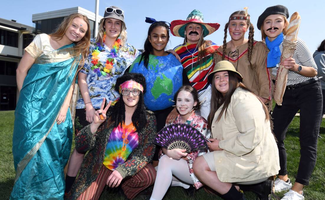 DRESS-UPS: Year 12 students Ellanor, Mia, Indy, Carcie, Kirsty, Eilish, Jade, Bella and Taylen don global costumes to celebrate Damascus Day. 