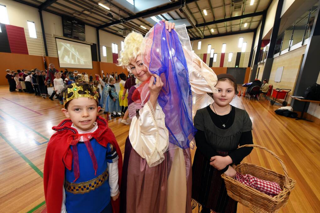 BASTILLE: Ballarat Christian College French teacher Kylie Weightman leads students Jordan and Lara in early Bastille Day celebrations. Picture: Jeremy Bannister