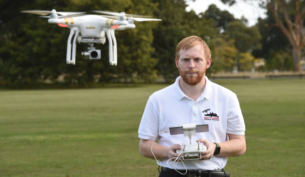 DRONE FLIGHT: Professional drone pilot Luke Parker of Skyline Drone Imaging welcomes the new Can I Fly There? safety app. Picture: Kate Healy