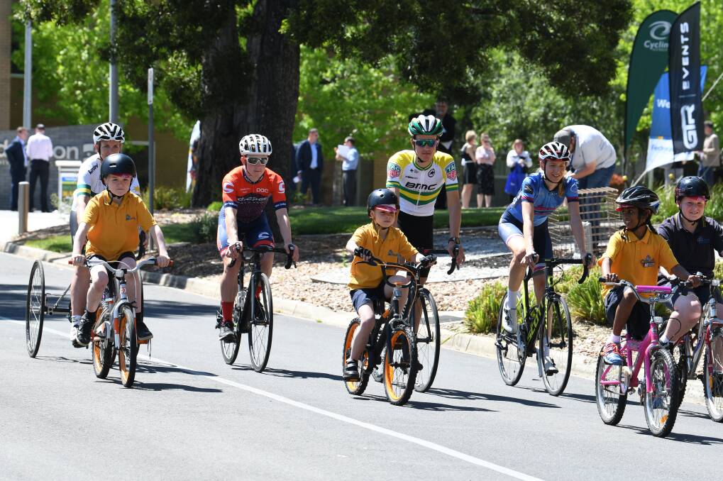 RACING: Ryley, Carol Cooke, Liam White, Mason, Miles Scotson, Lucy Kennedy, Nivash and Thomas hit the track at the official launch of the 2018 FedUni RoadNats. Picture: Kate Healy