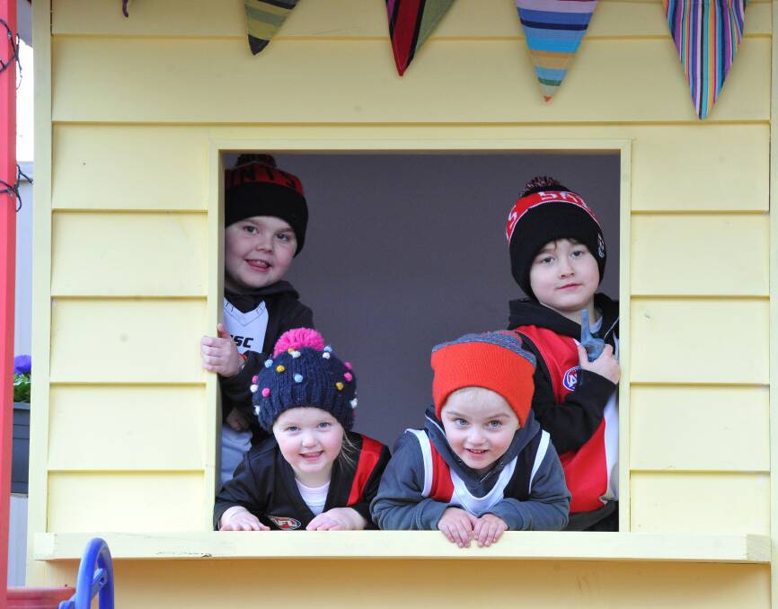 CUBBY CUTIES: The Shorter children Max, 7, William, 6, Hudson, 4, and Sofia, 2, enjoy William's new cubby house bakery in their Mt Clear back yard. Picture: Lachlan Bence