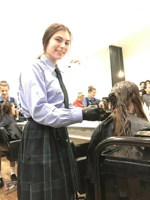 Olivia Spagnolo is excelling as a young hairdresser in training.