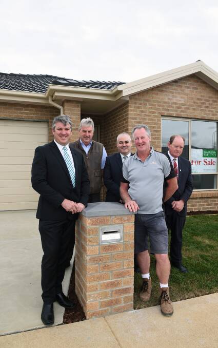 Great thinking: CHFL treasurer Paul Elliott, realtor Peter McErvale, Bendigo Bank's Jim O'Connel (middle) and Ian Flynn (right) and builder Des Rix. Picture: Kate Healy