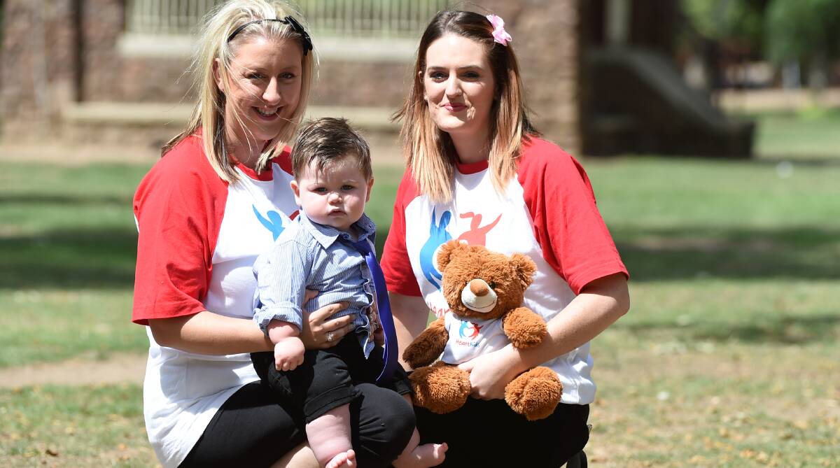 Heartfelt: Sarah Gambin with son Charlie Gambin (1) and Trista Johnson are holding a fundraiser for Childhood Heart Disease at Lake Wendouree. Picture: Lachlan Bence