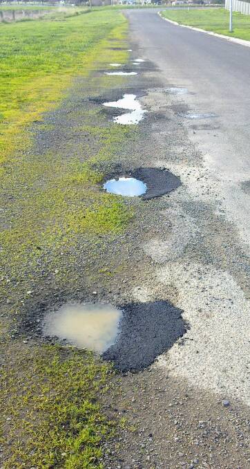 Half full: Paul Keating has blasted the City of Ballarat for its pothole repair works in Miners Rest. Picture: contributed