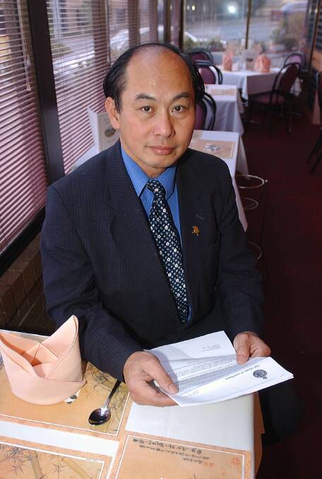 Henry Thai, pictured after winning his Order of Australia in 2002.