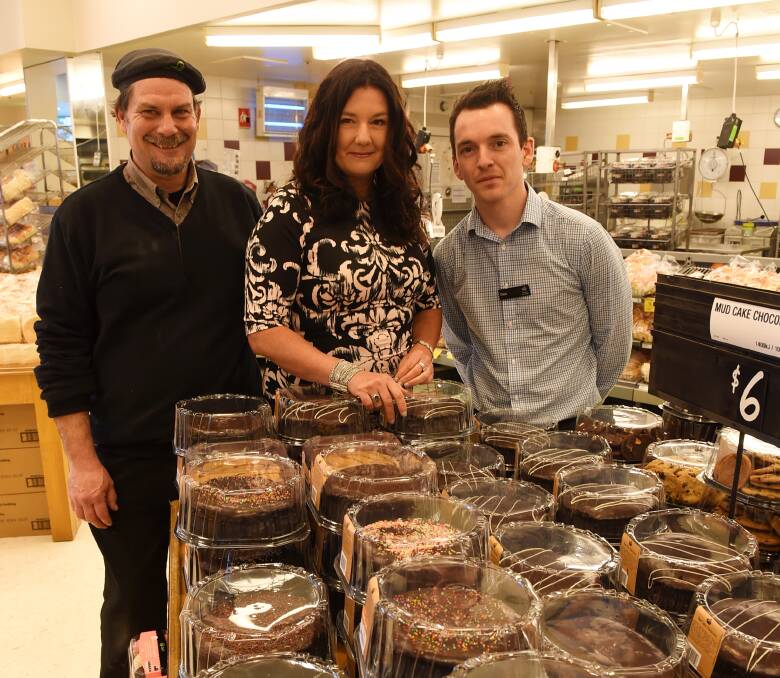 MORNING TEA: Woolworths Sebastopol bakery manager Gary Morris, Professor Caroline Taylor AM and Woolworths Sebastopol store manager Des Carter are joining forces during National Child Protection Week. Picture: Lachlan Bence