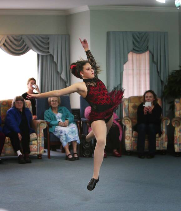 Elegant: The Academy of Classical Ballet student Hayley Hickman entertaining the residents of Pineview Residential Care. Picture: Luka Kauzlaric