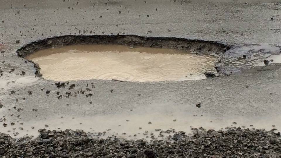 This pothole in Leith Street has caused serious damage to a Ballarat residents' car. Picture: The Road Ahead/Facebook