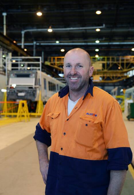 All smiles: Alstom's project supervisor Peter Walls has been with the company for more than 20 years and is part of its technology transfer process. Picture: Kate Healy