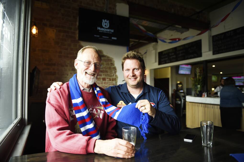 Father-son Western Bulldogs supporters Graham and Robert Allen.